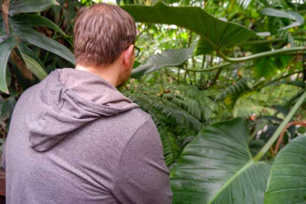 Man wearing Craghoppers Nosilife hoodie in jungle