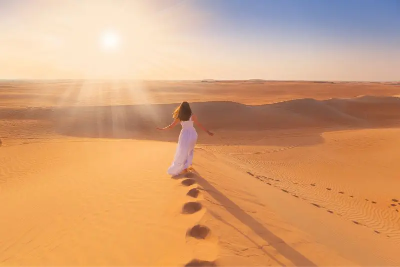 Girl wearing dress in the desert