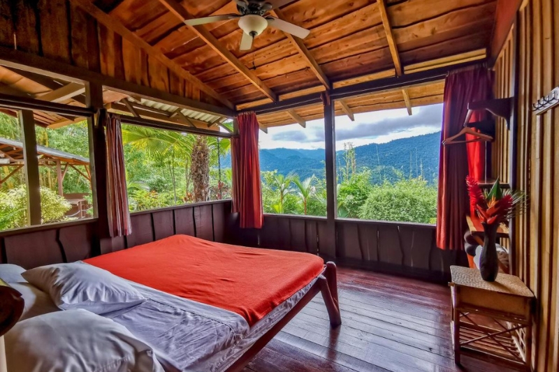 The bedroom at Santa Juana lodge overlooks the nature reserve at Manuel Antonio