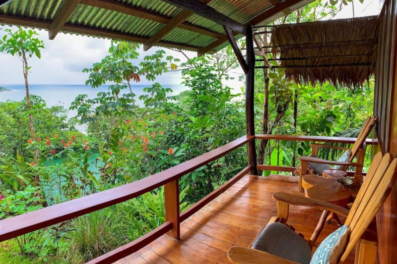 The sun terrace overlooking the water at Sunset Lodge, Drake Bay